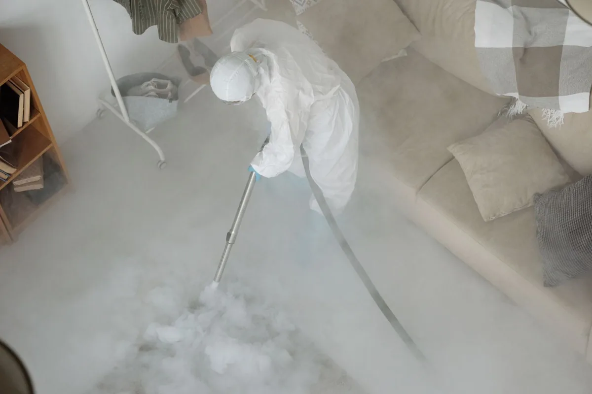 Biohazard cleanup technician in protective equipment, Dorchester, Boston, MA